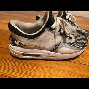 Blue and white Nike Air Max.  Slide on shoe no  need to unless the laces.